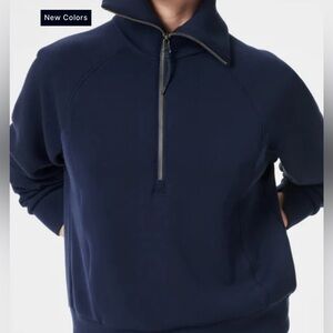SPANX AIR ESSENTIALS HALF ZIP in NAVY